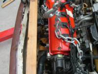 Check the gap between the wood and the front edge of the tappet cover are they parallel?